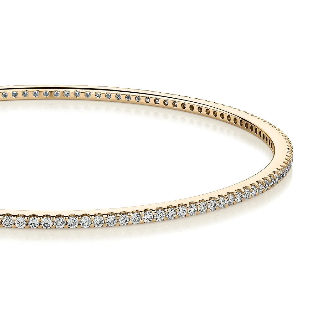 Signature Simulant Diamond 2 carat* TW round brilliant bangle in 10 carat yellow gold